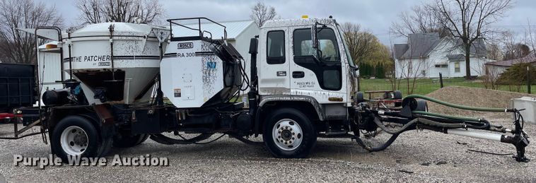 image for item OG9847 1997 GMC  7500 asphalt patch truck