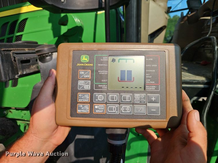 image for item EI3963 2022 John Deere 560M round baler