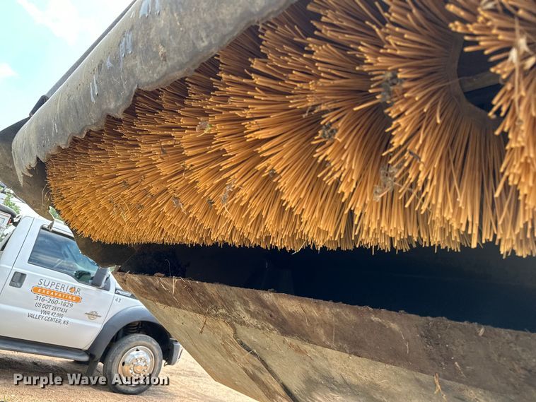 image for item DJ6248 2020 Caterpillar  BU118 skid steer sweeper