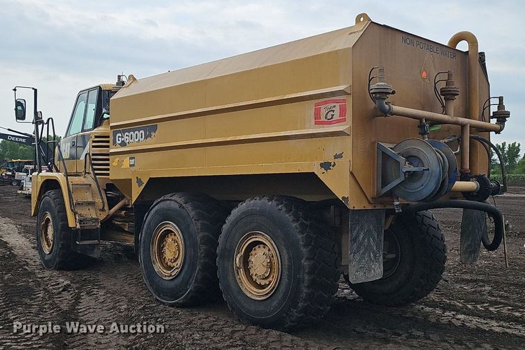 image for item DS4638 2012 Caterpillar 730 articulated water wagon