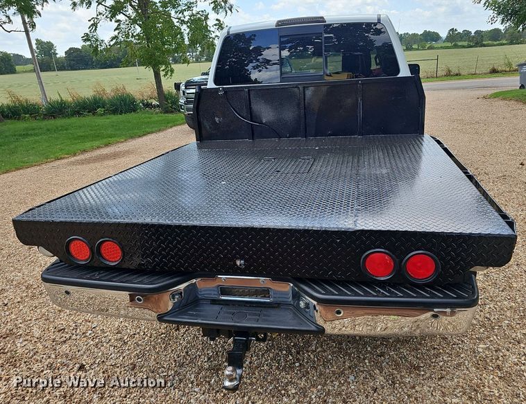 image for item EJ5807 2013 Nissan  Titan King Cab flatbed pickup truck