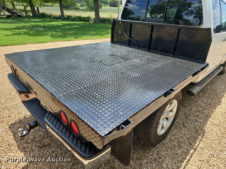 image for item EJ5807 2013 Nissan  Titan King Cab flatbed pickup truck
