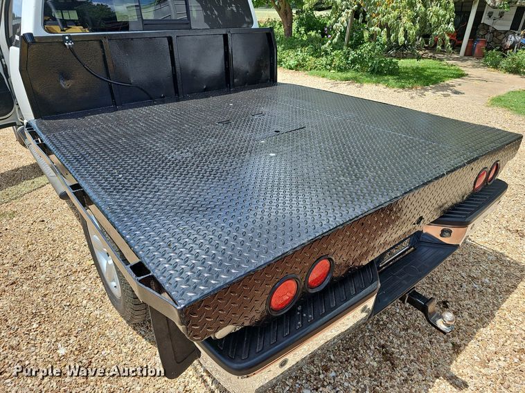 image for item EJ5807 2013 Nissan  Titan King Cab flatbed pickup truck