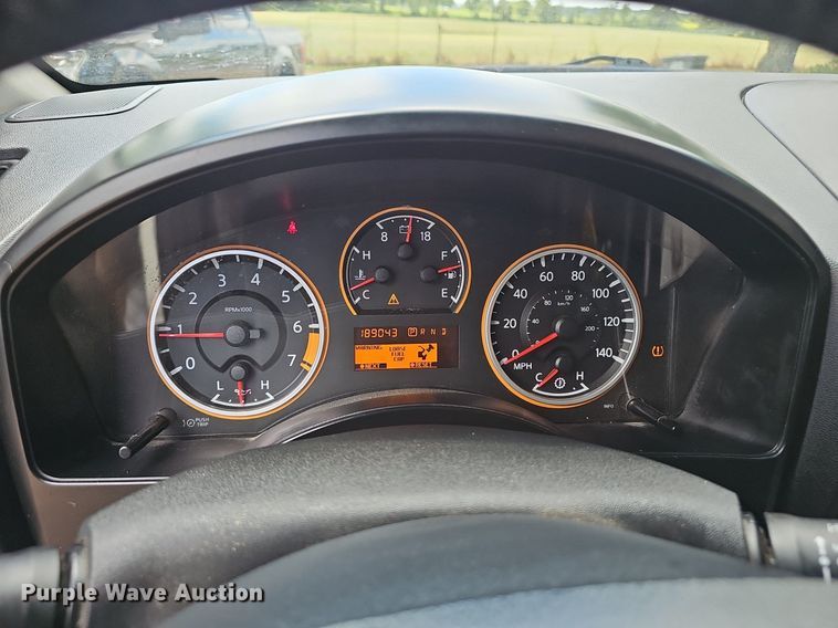 image for item EJ5807 2013 Nissan  Titan King Cab flatbed pickup truck