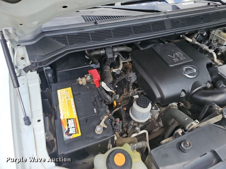 image for item EJ5807 2013 Nissan  Titan King Cab flatbed pickup truck