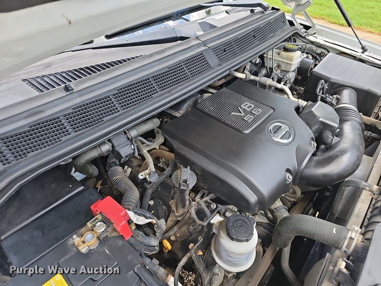 image for item EJ5807 2013 Nissan  Titan King Cab flatbed pickup truck