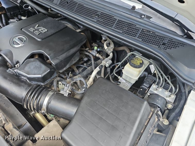 image for item EJ5807 2013 Nissan  Titan King Cab flatbed pickup truck