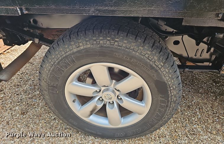 image for item EJ5807 2013 Nissan  Titan King Cab flatbed pickup truck