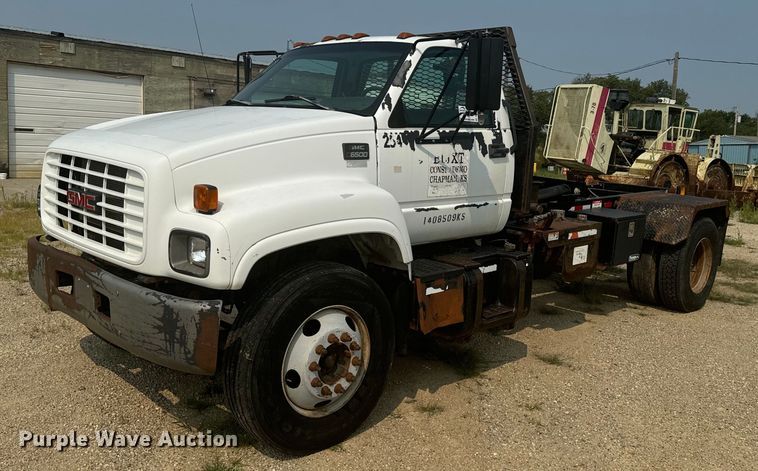 image for item DQ6904 1997 GMC C7500 roll-off container truck