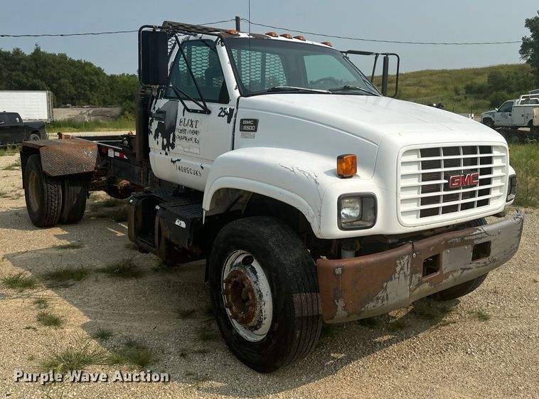 image for item DQ6904 1997 GMC C7500 roll-off container truck