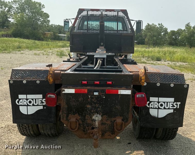 image for item DQ6904 1997 GMC C7500 roll-off container truck