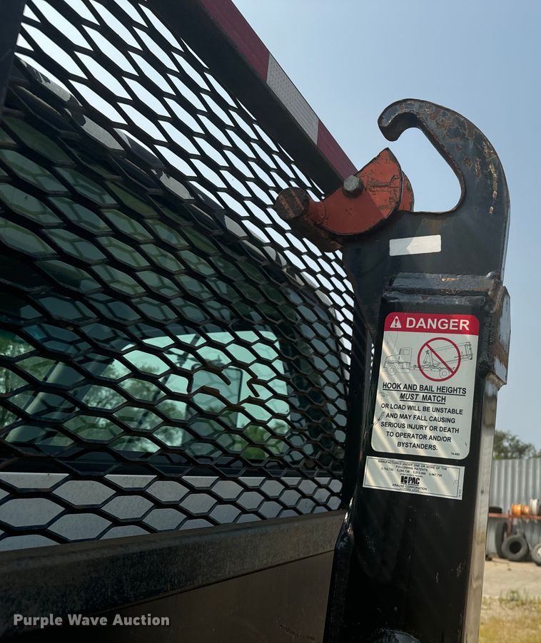 image for item DQ6904 1997 GMC C7500 roll-off container truck