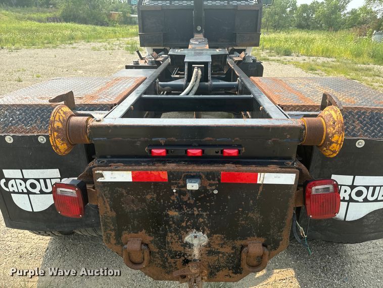 image for item DQ6904 1997 GMC C7500 roll-off container truck