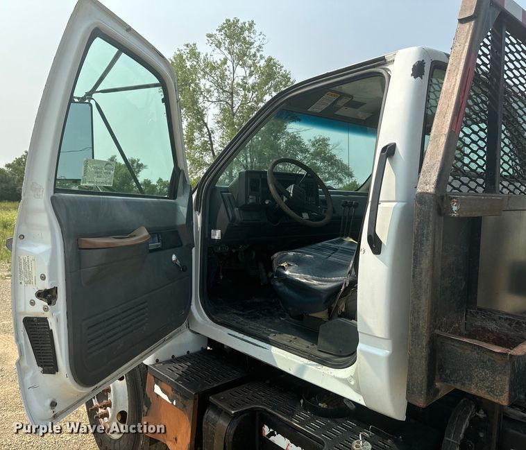 image for item DQ6904 1997 GMC C7500 roll-off container truck