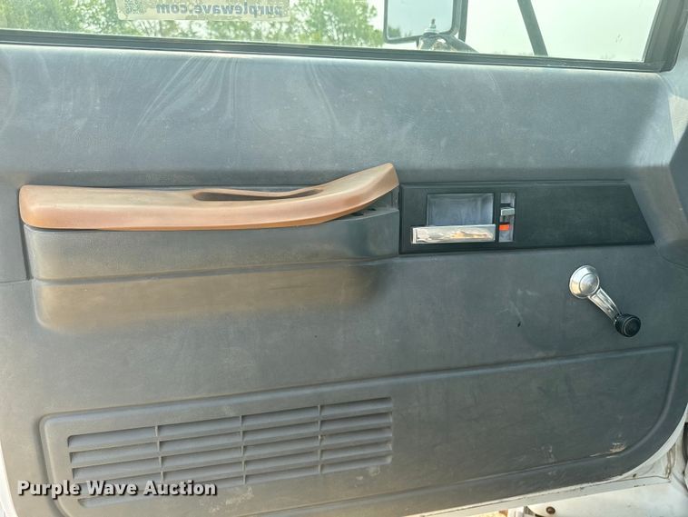 image for item DQ6904 1997 GMC C7500 roll-off container truck