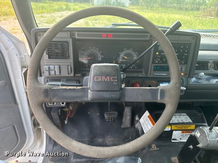 image for item DQ6904 1997 GMC C7500 roll-off container truck