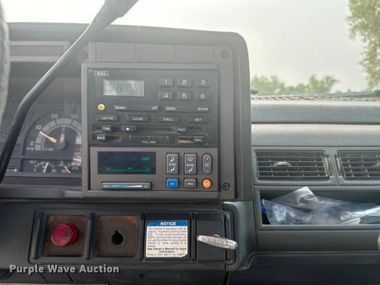 image for item DQ6904 1997 GMC C7500 roll-off container truck