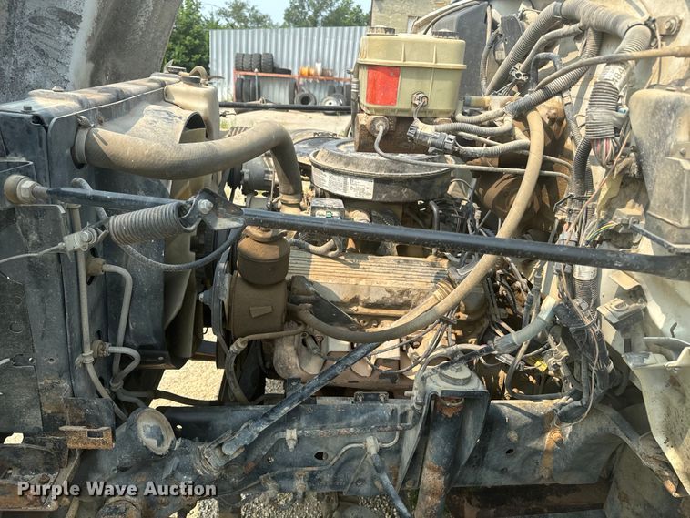 image for item DQ6904 1997 GMC C7500 roll-off container truck