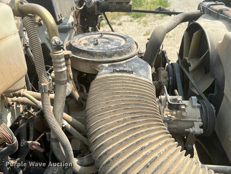 image for item DQ6904 1997 GMC C7500 roll-off container truck