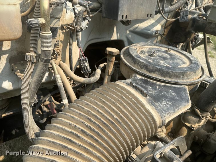 image for item DQ6904 1997 GMC C7500 roll-off container truck