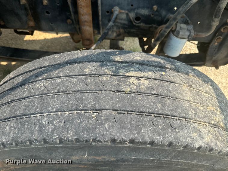 image for item DQ6904 1997 GMC C7500 roll-off container truck