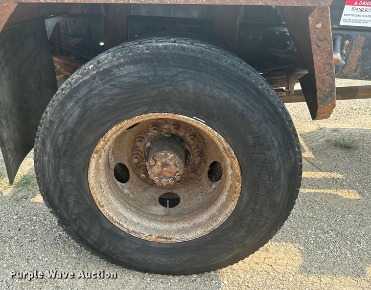 image for item DQ6904 1997 GMC C7500 roll-off container truck