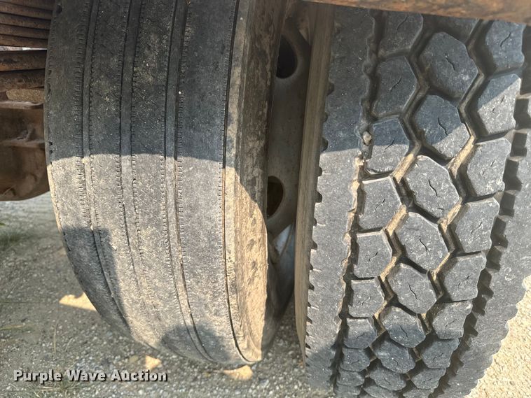 image for item DQ6904 1997 GMC C7500 roll-off container truck