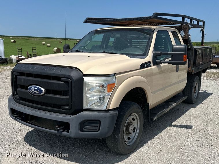 image for item EJ6438 2011 Ford F250 Super Duty SuperCab flatbed pickup truck