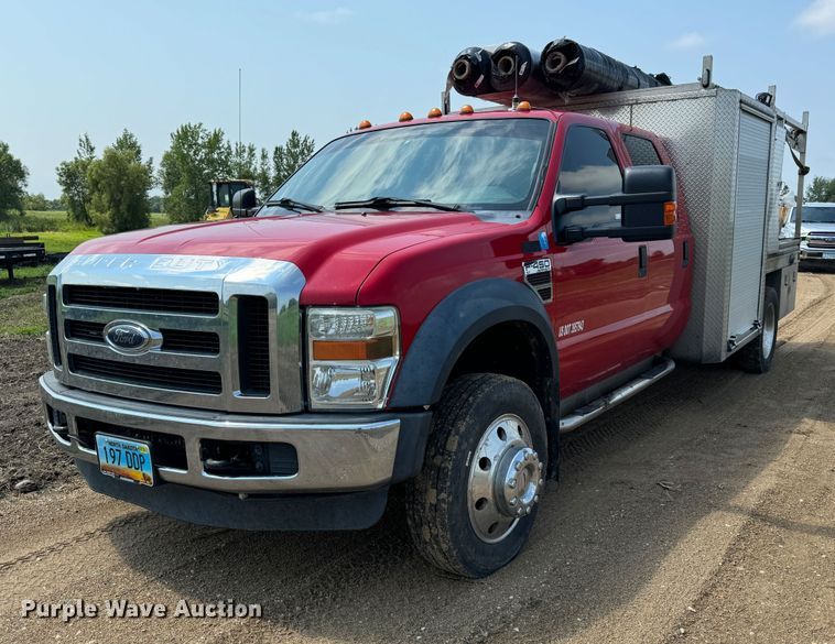 image for item NB9514 2009 Ford  F450 Super Duty XLT Crew Cab flatbed truck