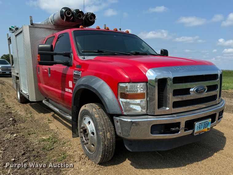 image for item NB9514 2009 Ford  F450 Super Duty XLT Crew Cab flatbed truck