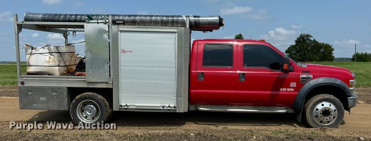 image for item NB9514 2009 Ford  F450 Super Duty XLT Crew Cab flatbed truck