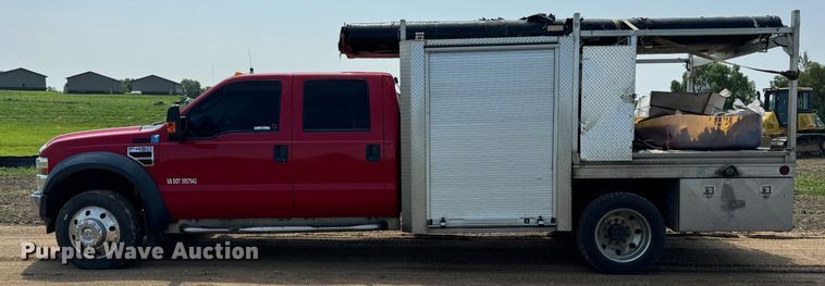 image for item NB9514 2009 Ford  F450 Super Duty XLT Crew Cab flatbed truck