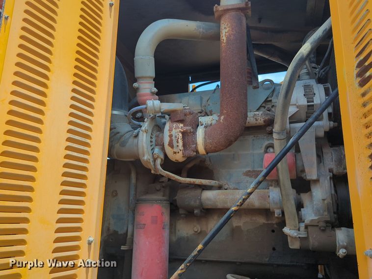 image for item NG9977 2005 GMC 7500 asphalt patch truck