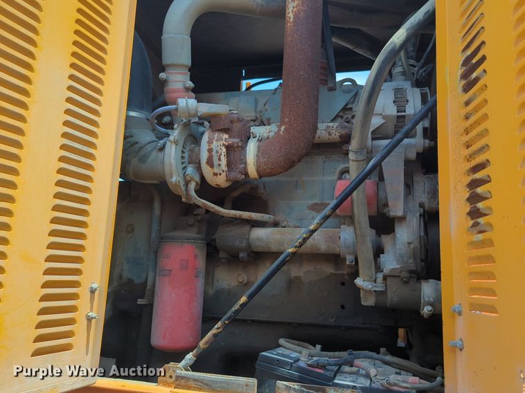 image for item NG9977 2005 GMC 7500 asphalt patch truck