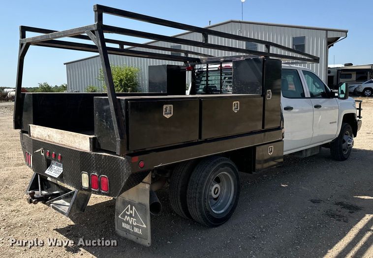 image for item NQ9640 2015 Chevrolet Silverado 3500HD Crew Cab flatbed pickup truck