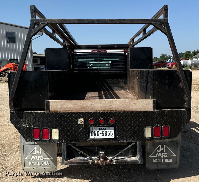 image for item NQ9640 2015 Chevrolet Silverado 3500HD Crew Cab flatbed pickup truck