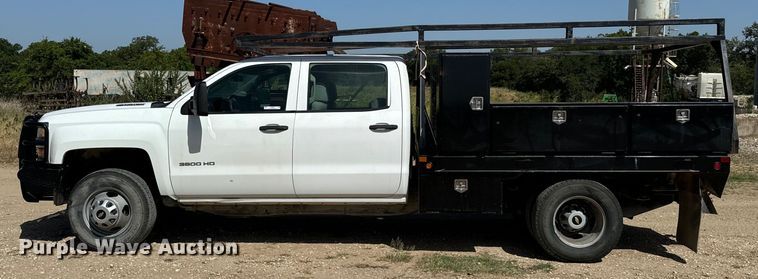 image for item NQ9640 2015 Chevrolet Silverado 3500HD Crew Cab flatbed pickup truck