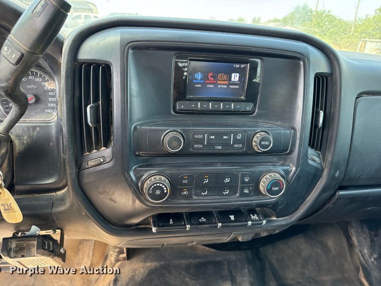 image for item NQ9640 2015 Chevrolet Silverado 3500HD Crew Cab flatbed pickup truck