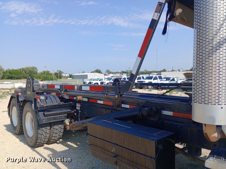 image for item NY9326 2007 Mack CV713 roll-off container truck