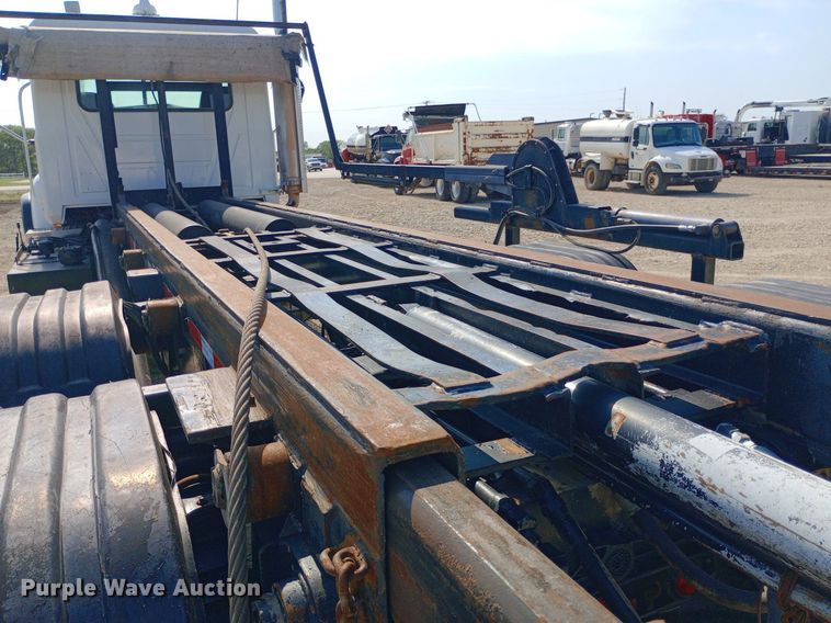 image for item NY9326 2007 Mack CV713 roll-off container truck