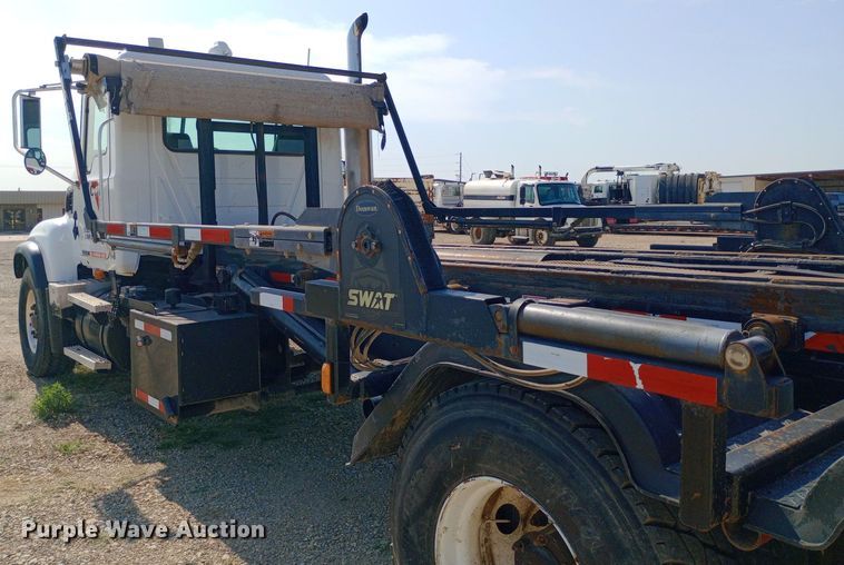 image for item NY9326 2007 Mack CV713 roll-off container truck