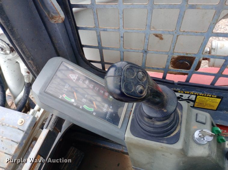 image for item NY9333 Takeuchi TL140 tracked skid steer loader