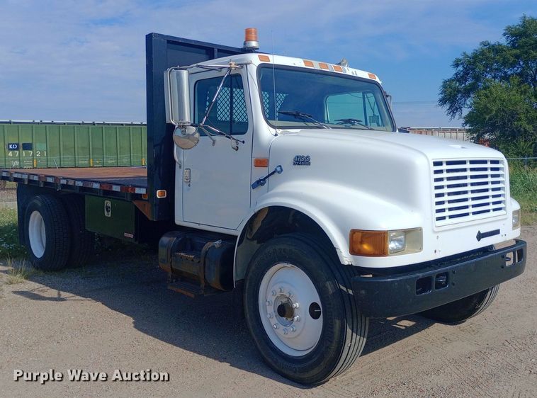 image for item NY9346 1999 International  4700 dump flatbed truck