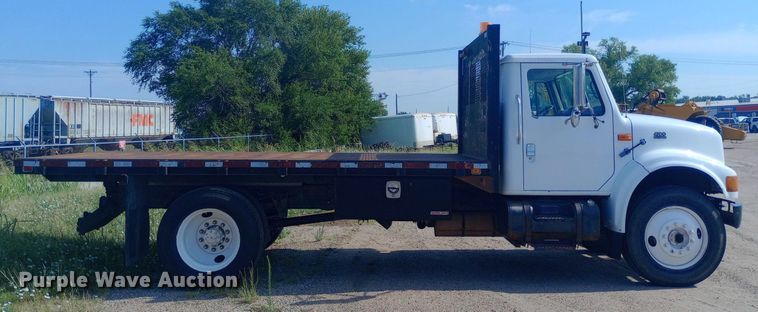 image for item NY9346 1999 International  4700 dump flatbed truck