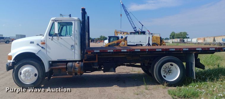 image for item NY9346 1999 International  4700 dump flatbed truck