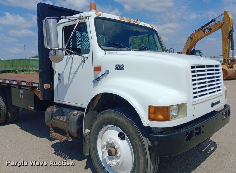 image for item NY9346 1999 International  4700 dump flatbed truck