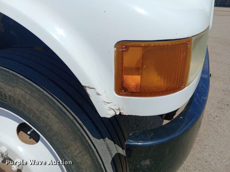 image for item NY9346 1999 International  4700 dump flatbed truck