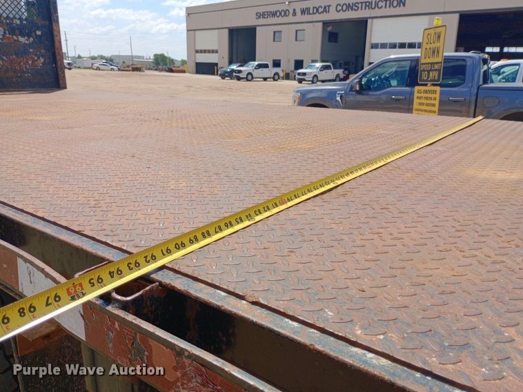 image for item NY9346 1999 International  4700 dump flatbed truck