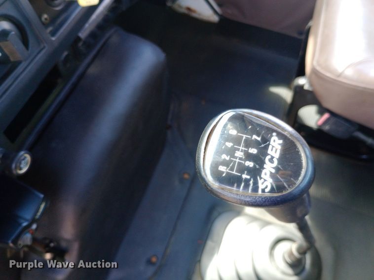 image for item NY9346 1999 International  4700 dump flatbed truck