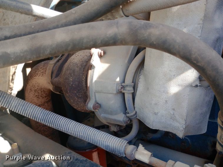 image for item NY9346 1999 International  4700 dump flatbed truck